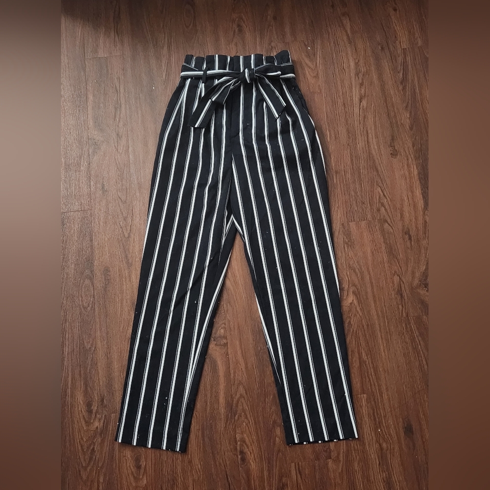 Navy and white striped slacks with a ribbon belt